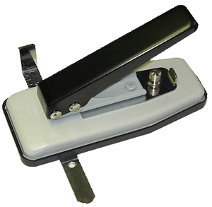 Compact stapler slot punch